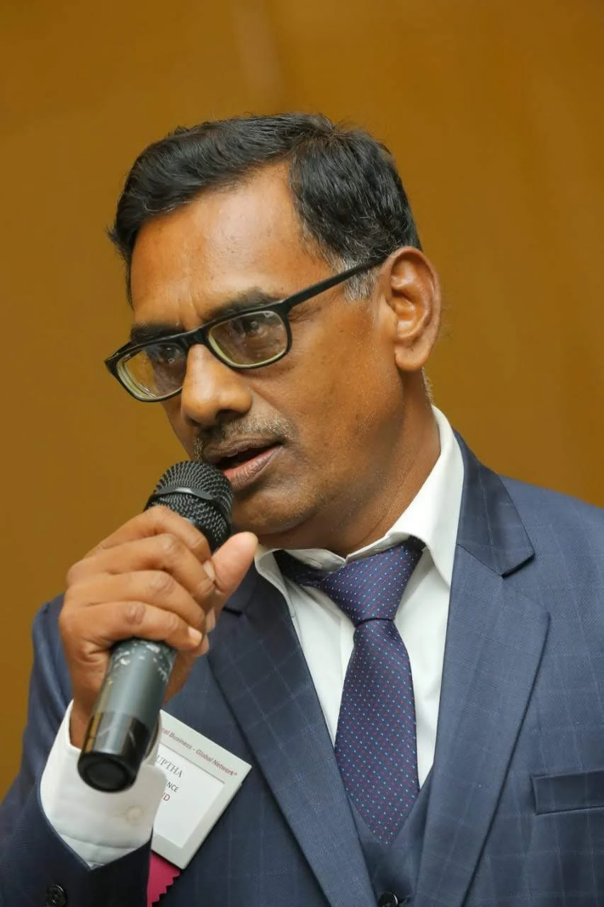Tatavarthi Yoganjaneya Gupta speaking at a professional gathering